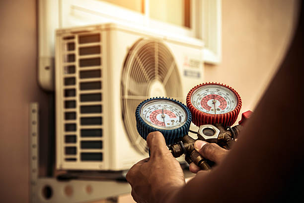 Professional Hvac technician working in Stevensville, MD